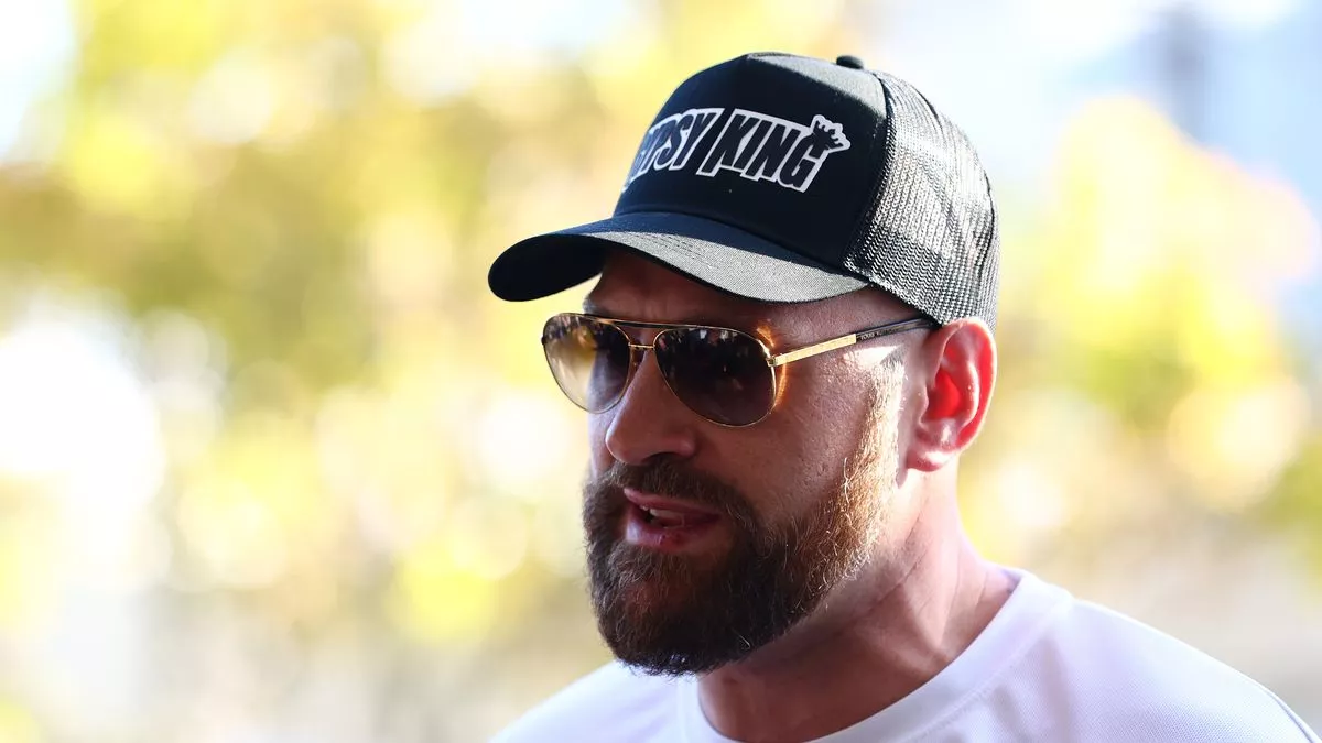 Tyson Fury hits the deck after being escorted out of bar by bouncer